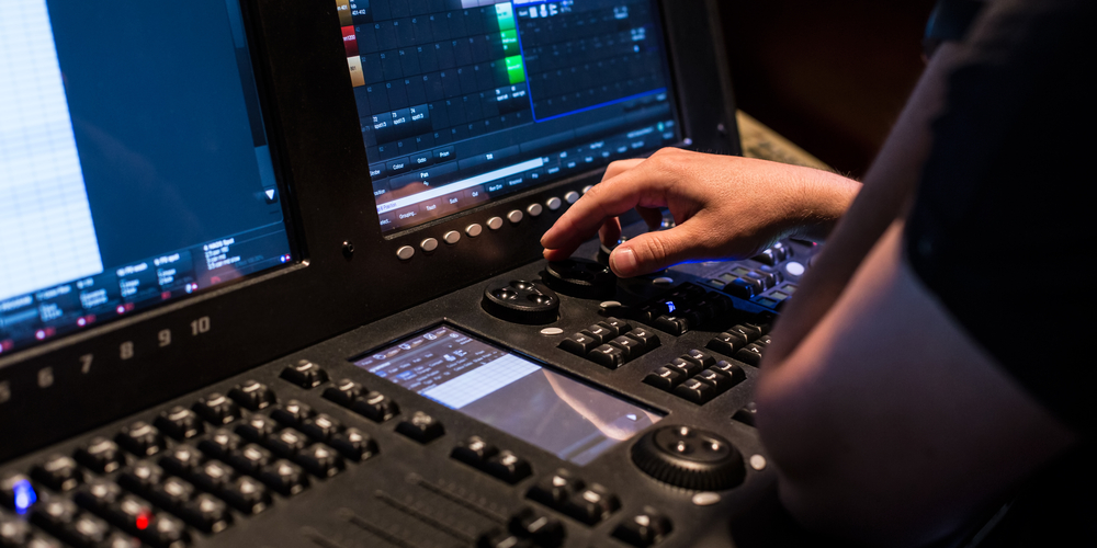 A person on a computer Description automatically generated