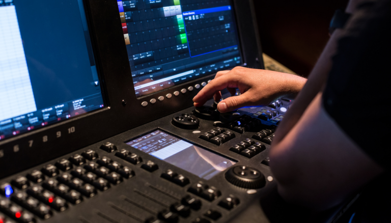 A person on a computer Description automatically generated