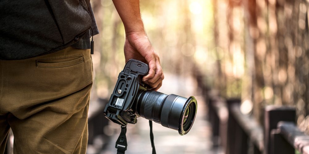 How can photographers make extra money during the holidays?