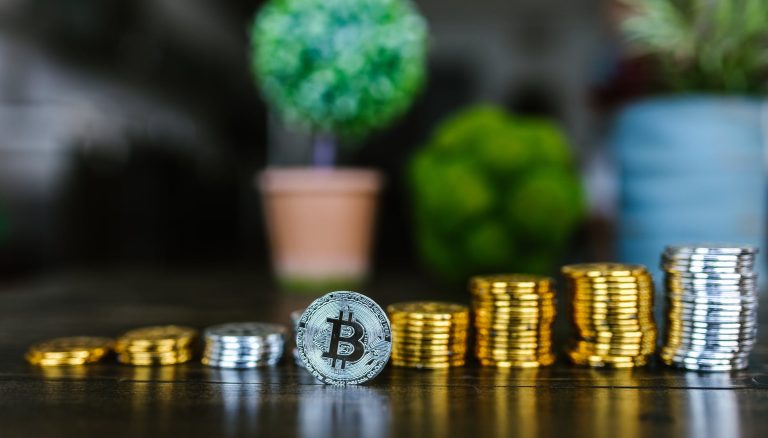 close up shot of stock of coins