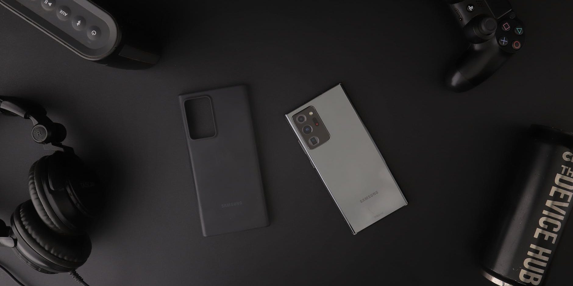 phone and other devices on black table