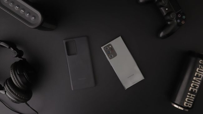 phone and other devices on black table