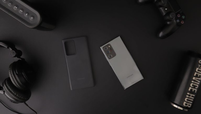 phone and other devices on black table