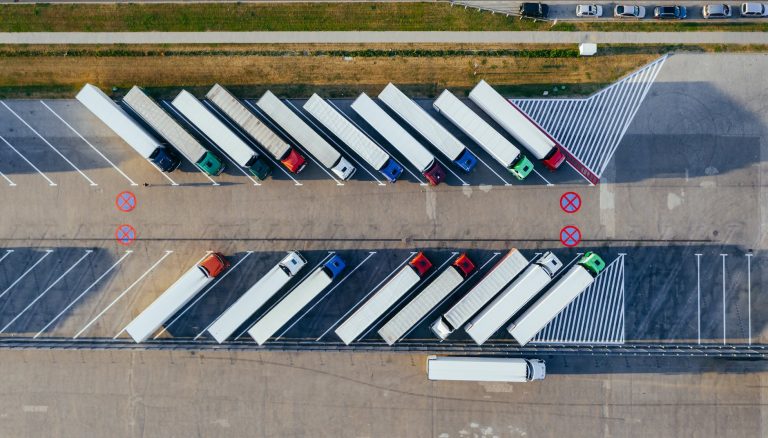 aerial photography of trucks parked