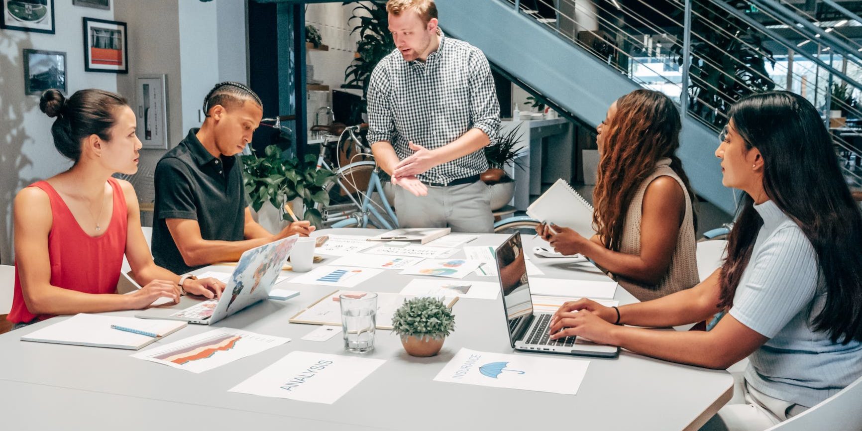 people having a meeting in an office
