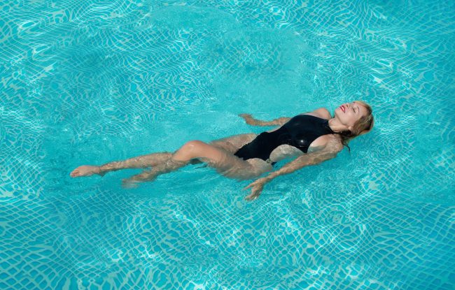 a woman in a swimming pool