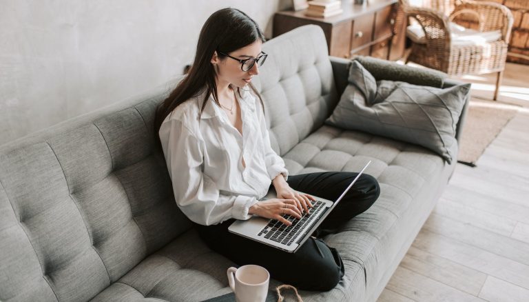 woman working at home using laptop