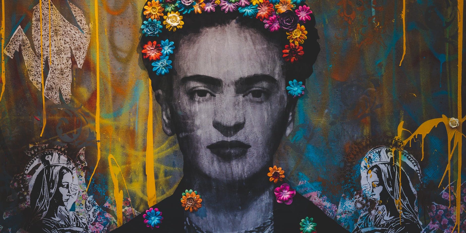 creative graffiti wall with portrait of frida kahlo