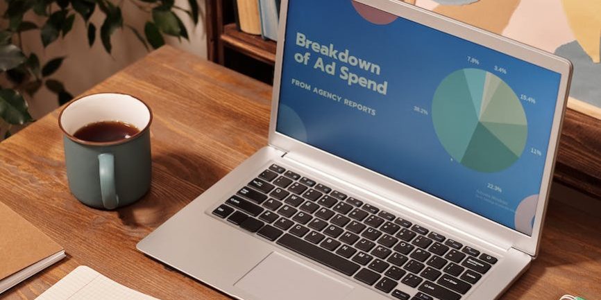 laptop on wooden desk