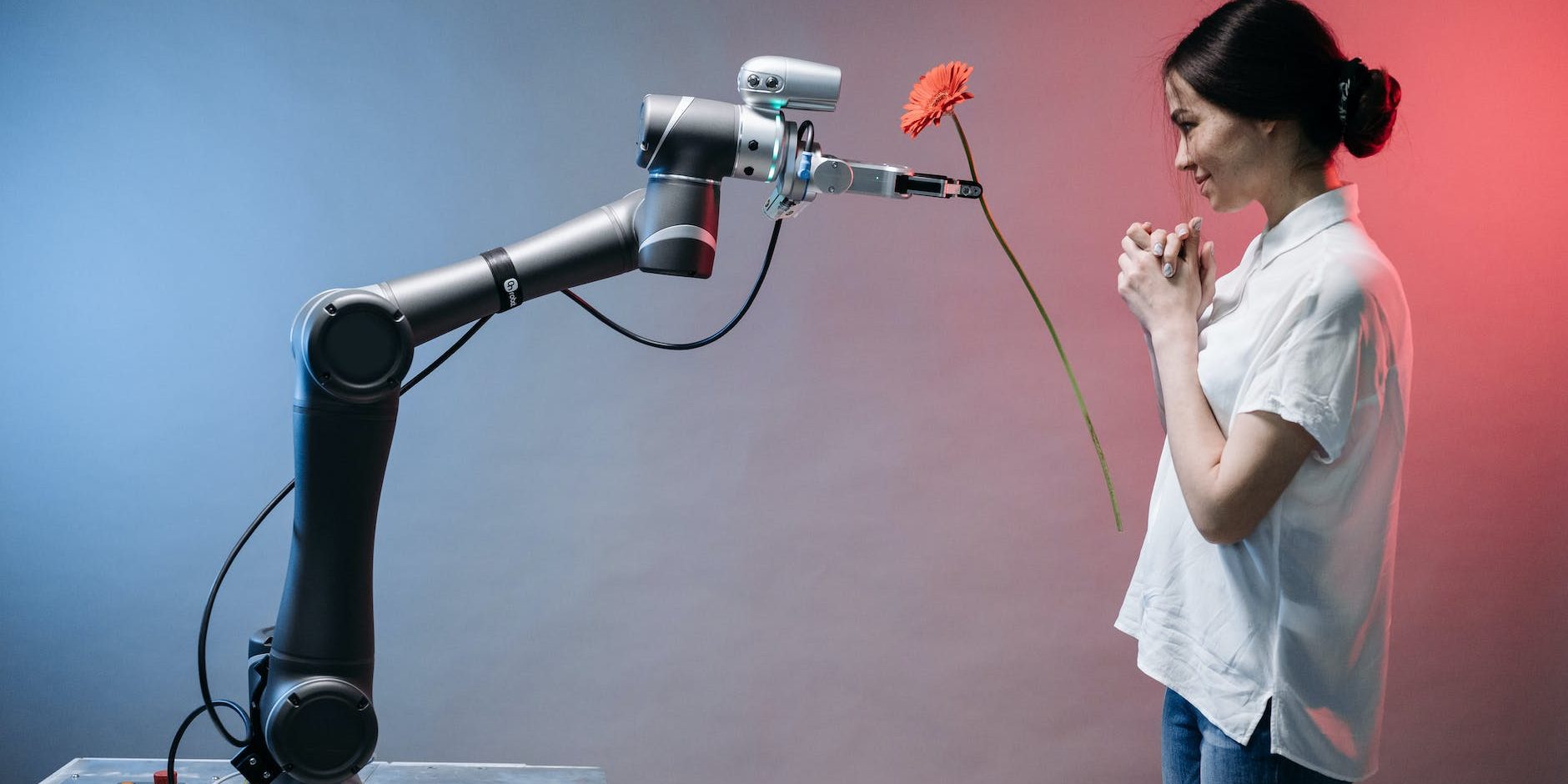 a robot holding a flower