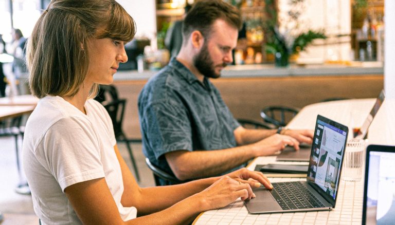 photo of woman using laptop