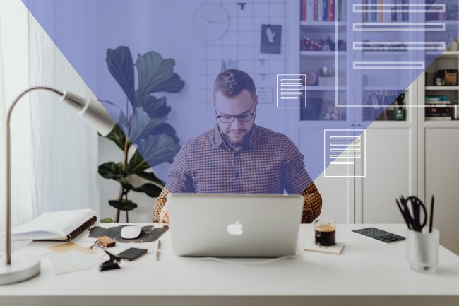 man in blue and white checkered dress shirt using silver macbook