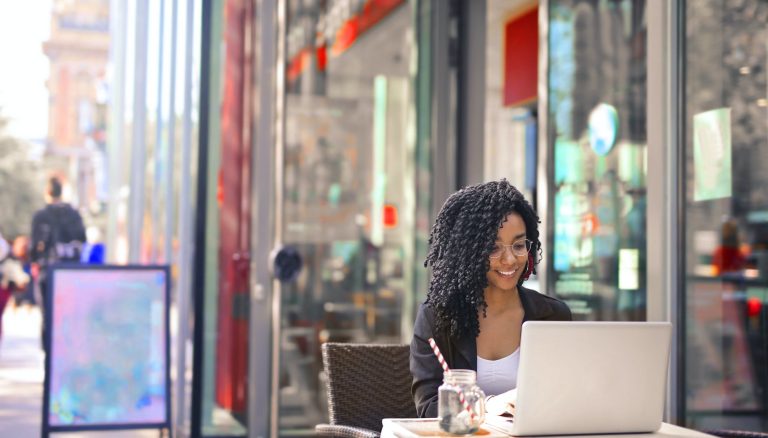 woman in black long sleeve shirt sitting on chair
