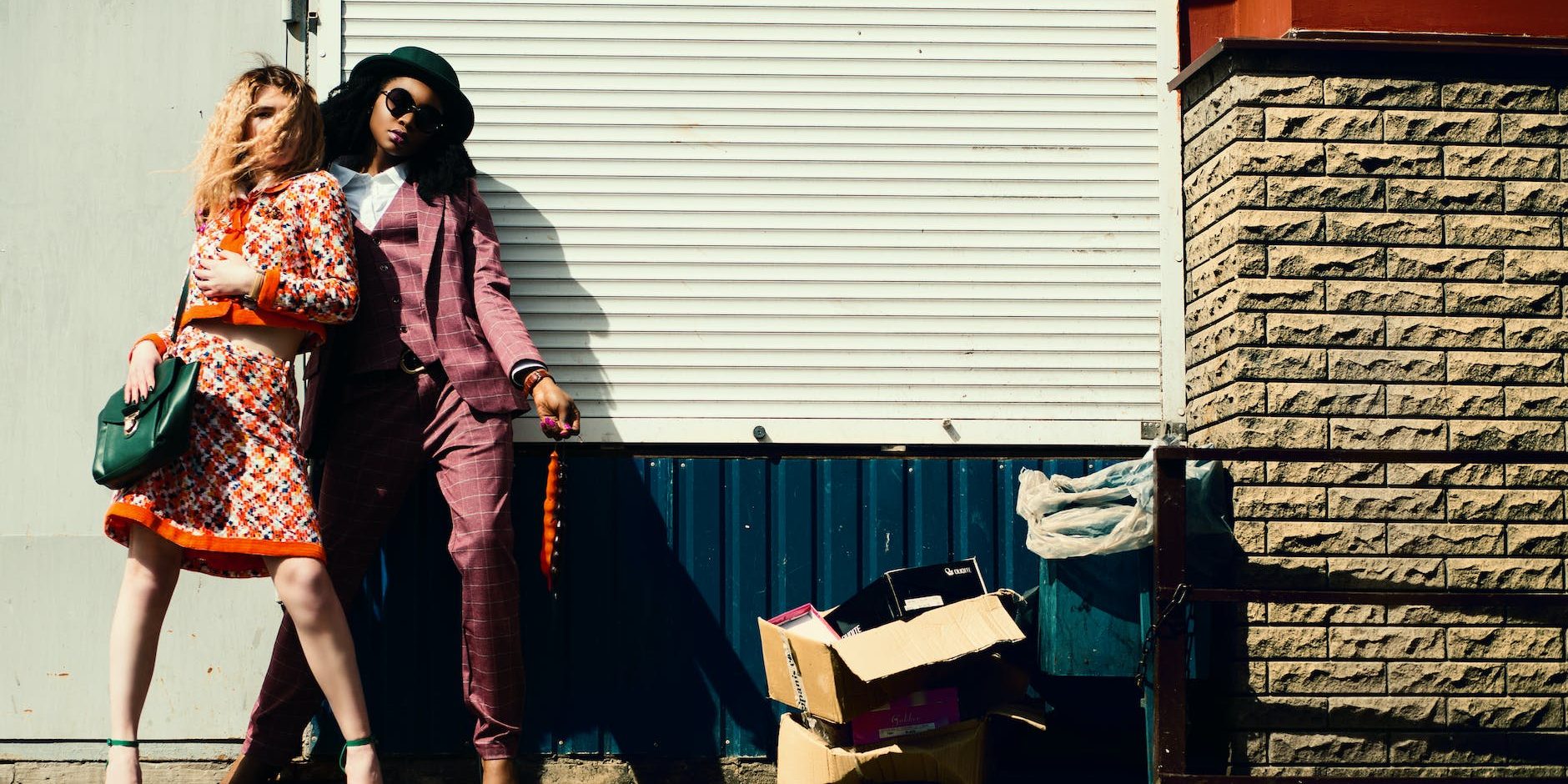 woman in orange blazer