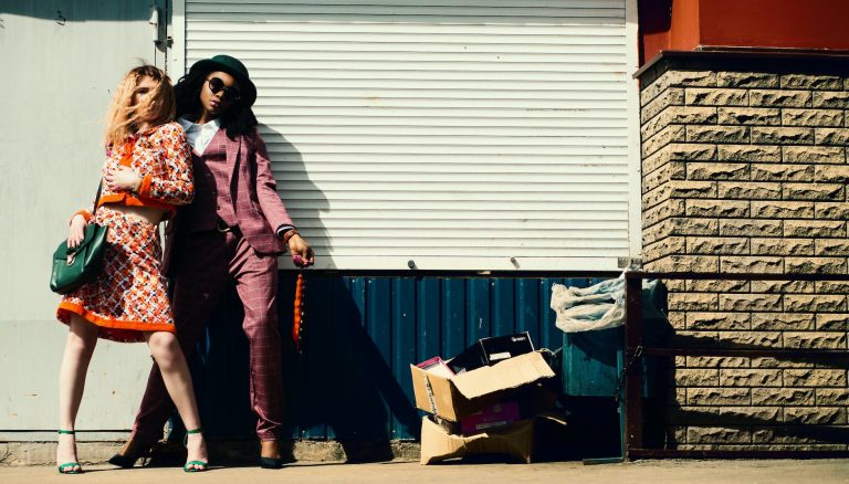woman in orange blazer