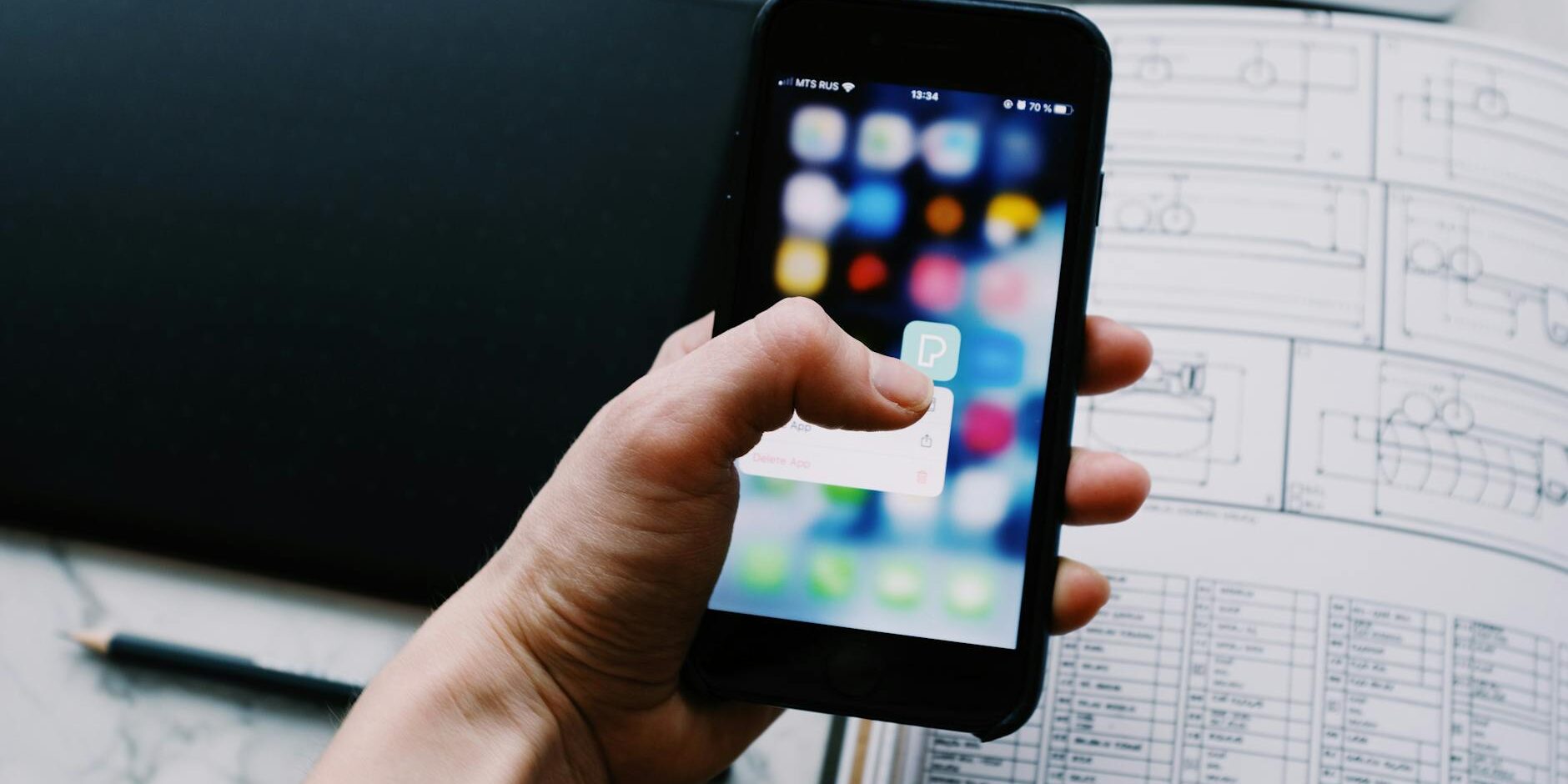 person holding black smartphone