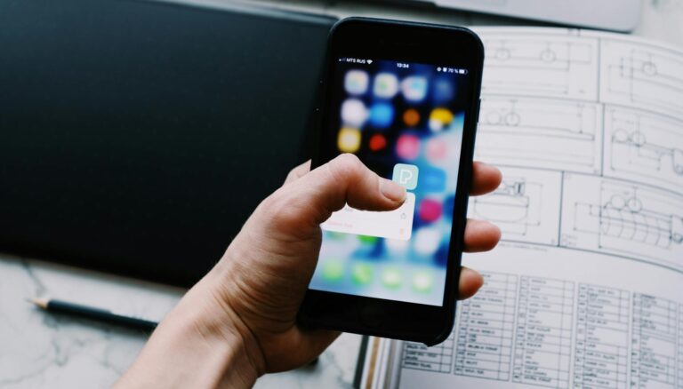 person holding black smartphone