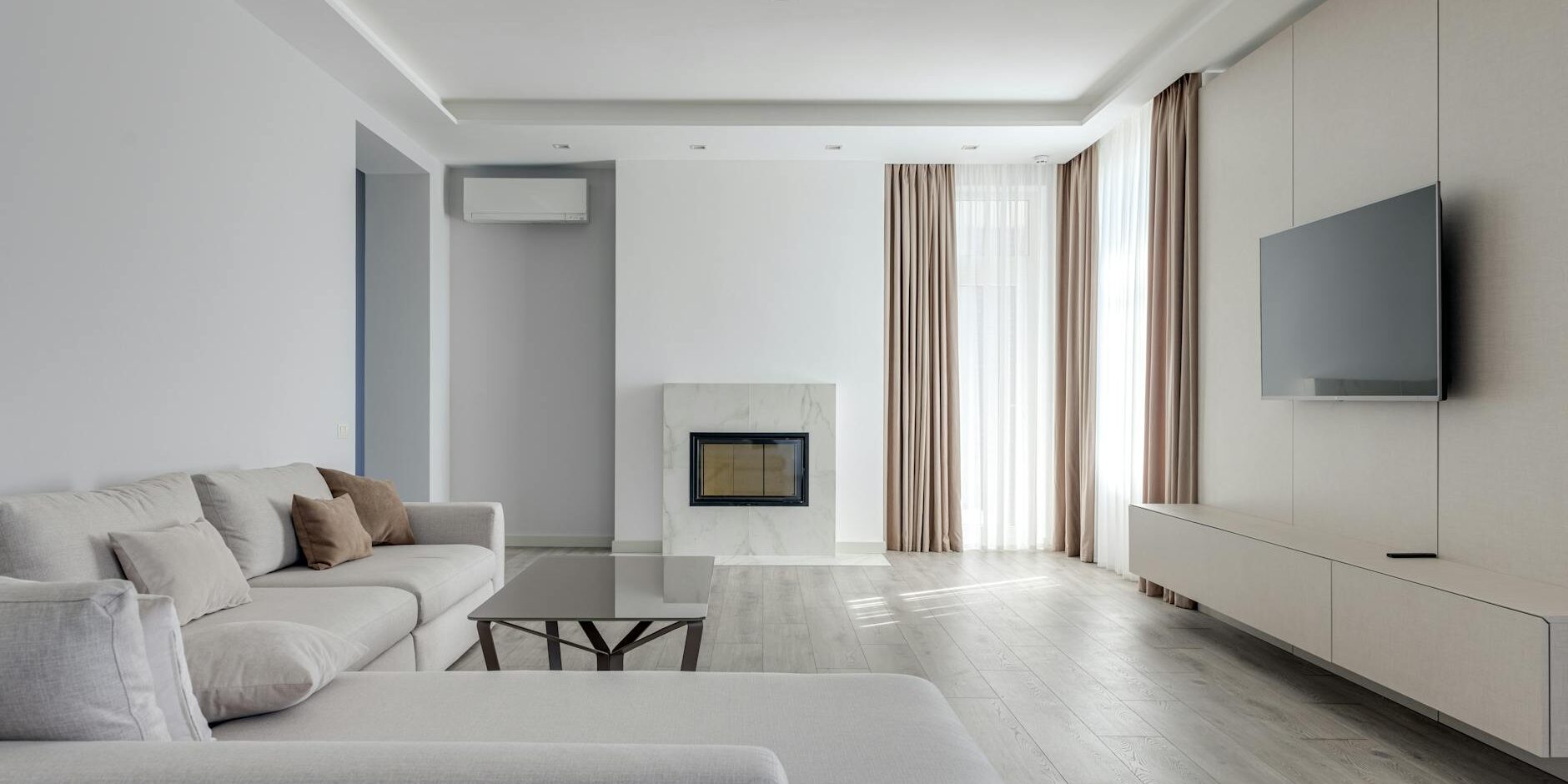 spacious lounge room with soft furniture