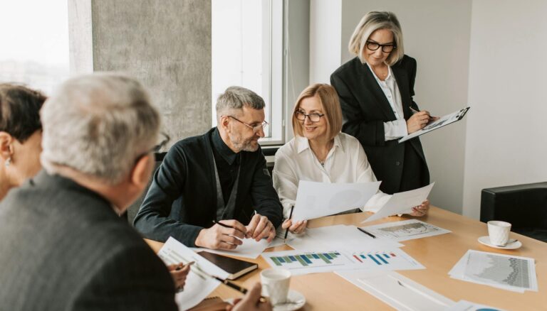 colleagues looking at documents
