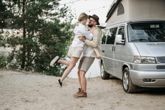 couple standing near the van