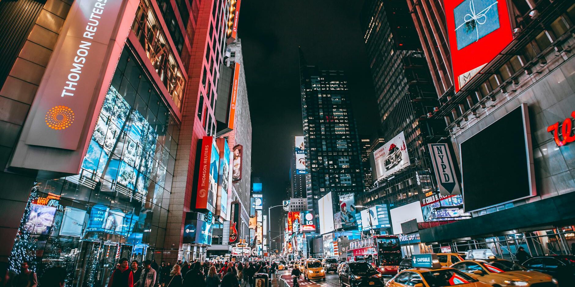 crowd of people on street during night time