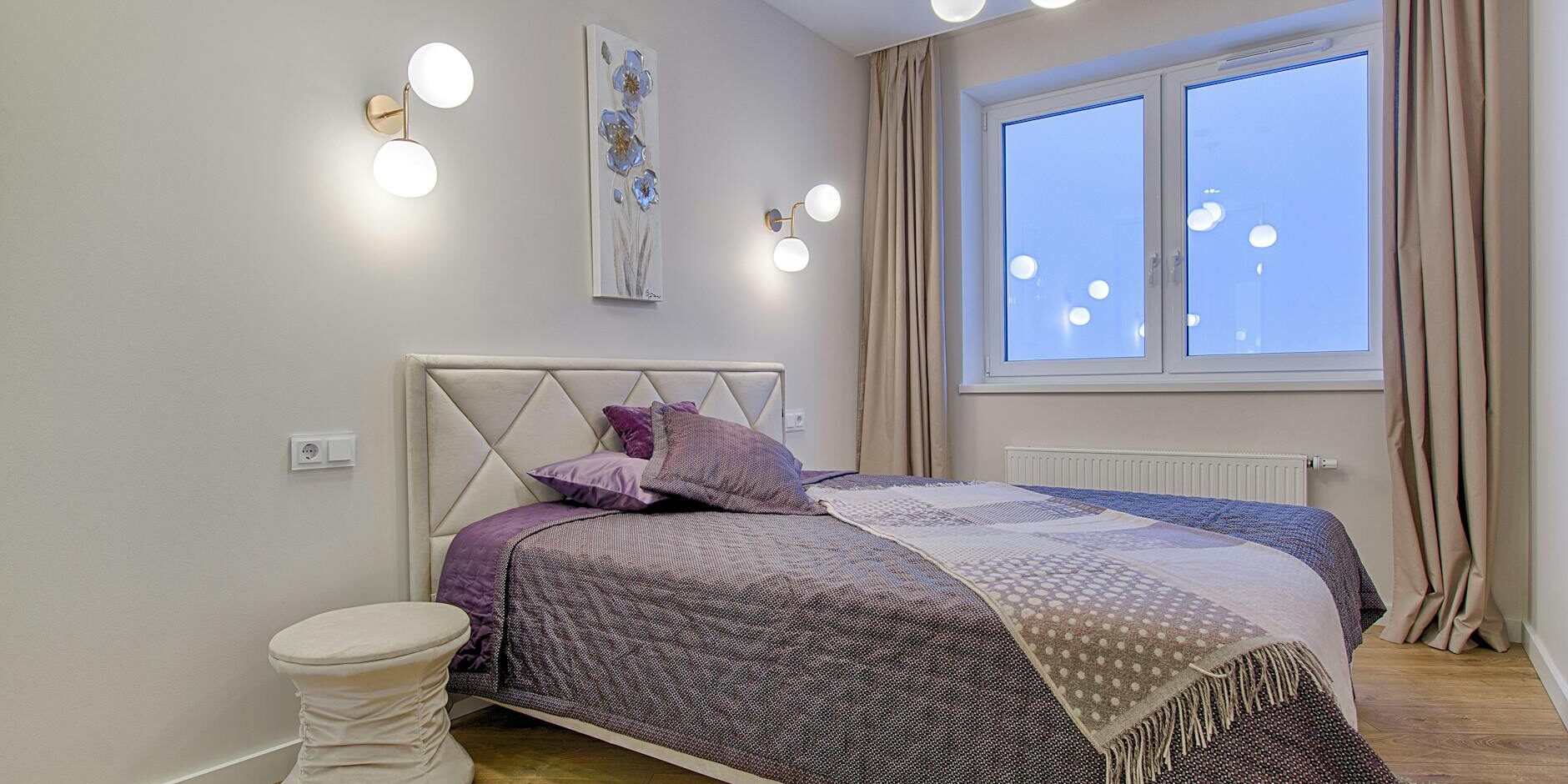 room with bed and wooden floor