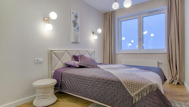 room with bed and wooden floor