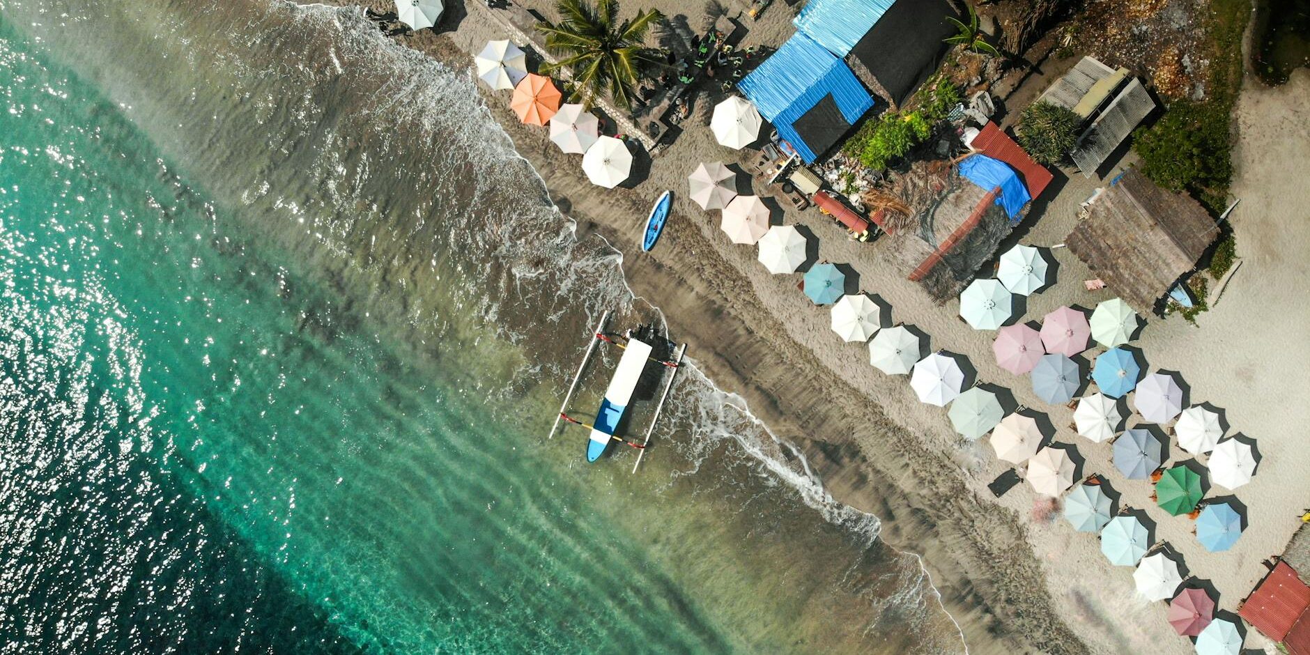 aerial view of boat on seashore