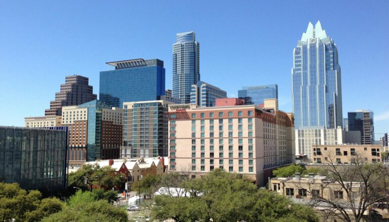 concrete buildings under blue sky