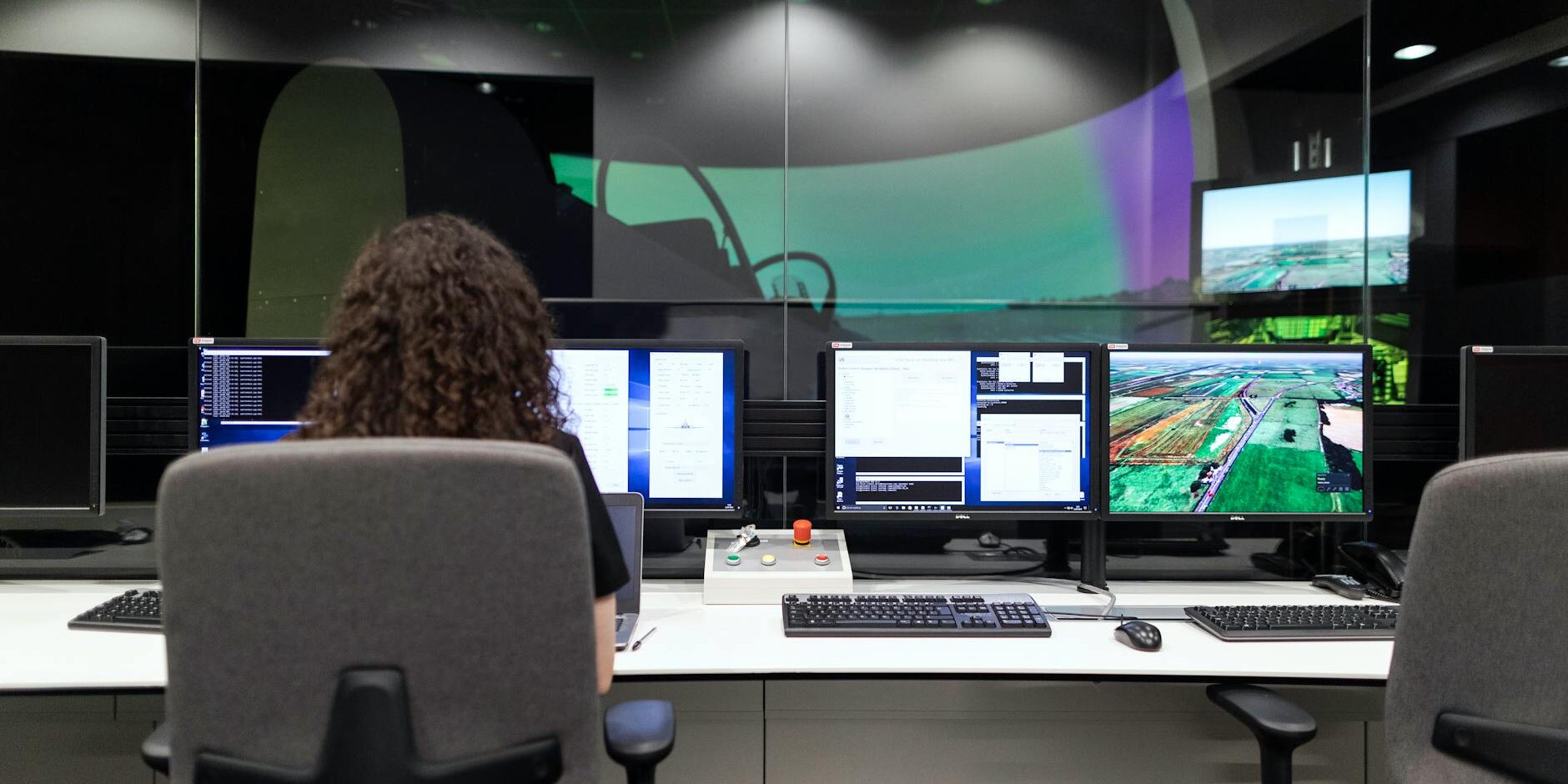 female engineer controlling flight simulator