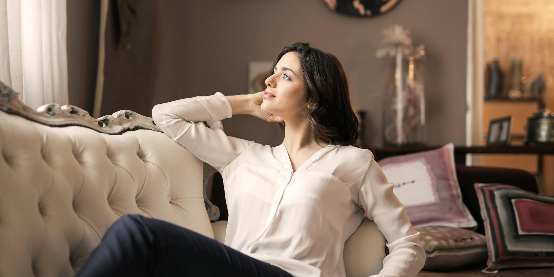 woman in white dress shirt and black pants