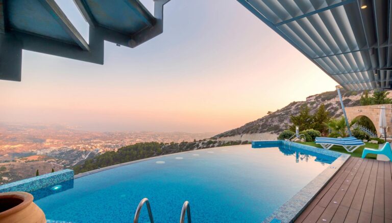 blue lounger beside swimming pool