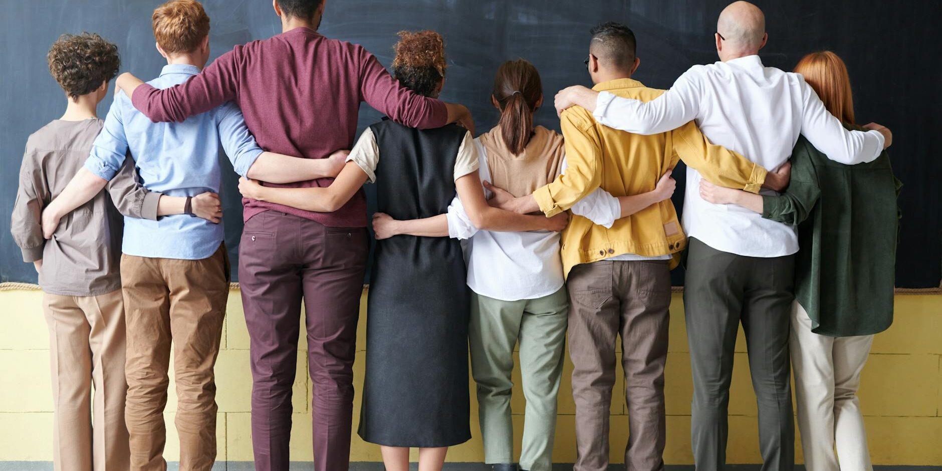 group of people standing indoors