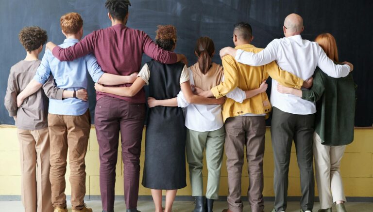 group of people standing indoors