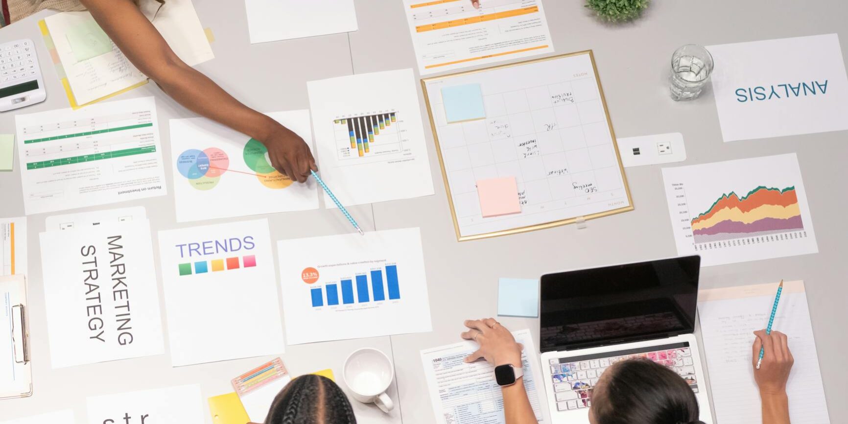 woman pointing on the white paper