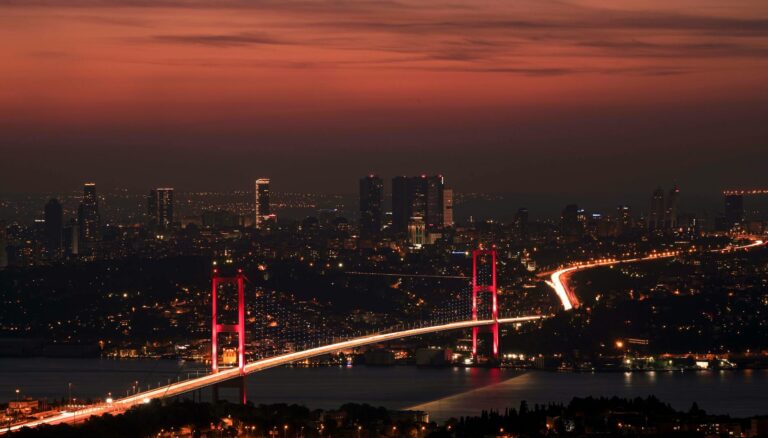 a stunning view of the bosphorus bridge at istanbul during the night
