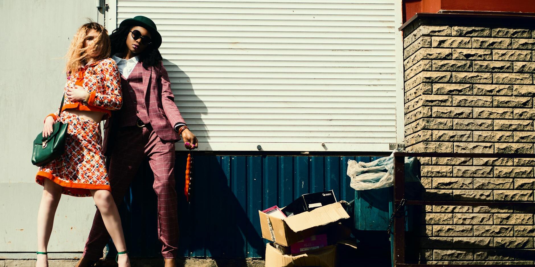 woman in orange blazer