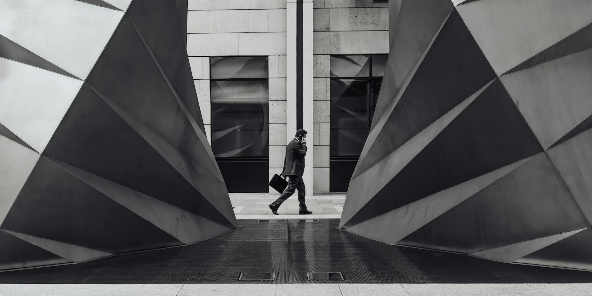 man carrying suitcase