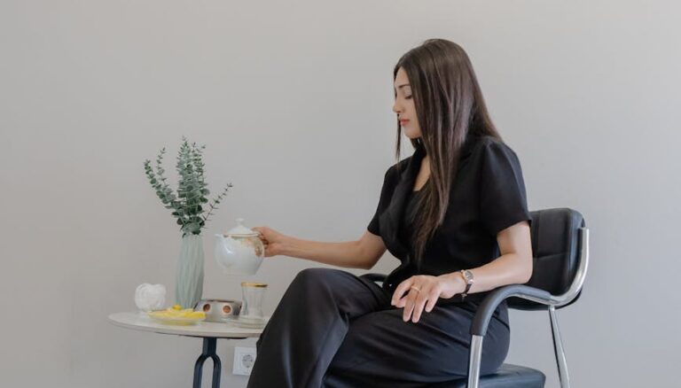 stylish woman enjoying tea in minimalist interior