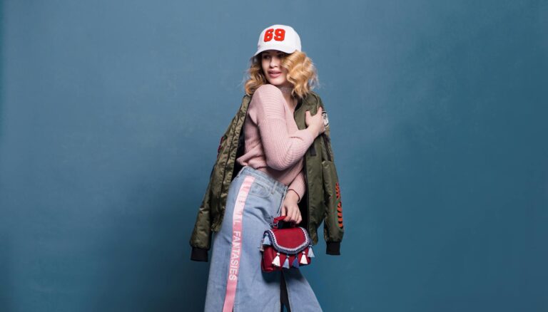 woman in pink sweater and denim skirt