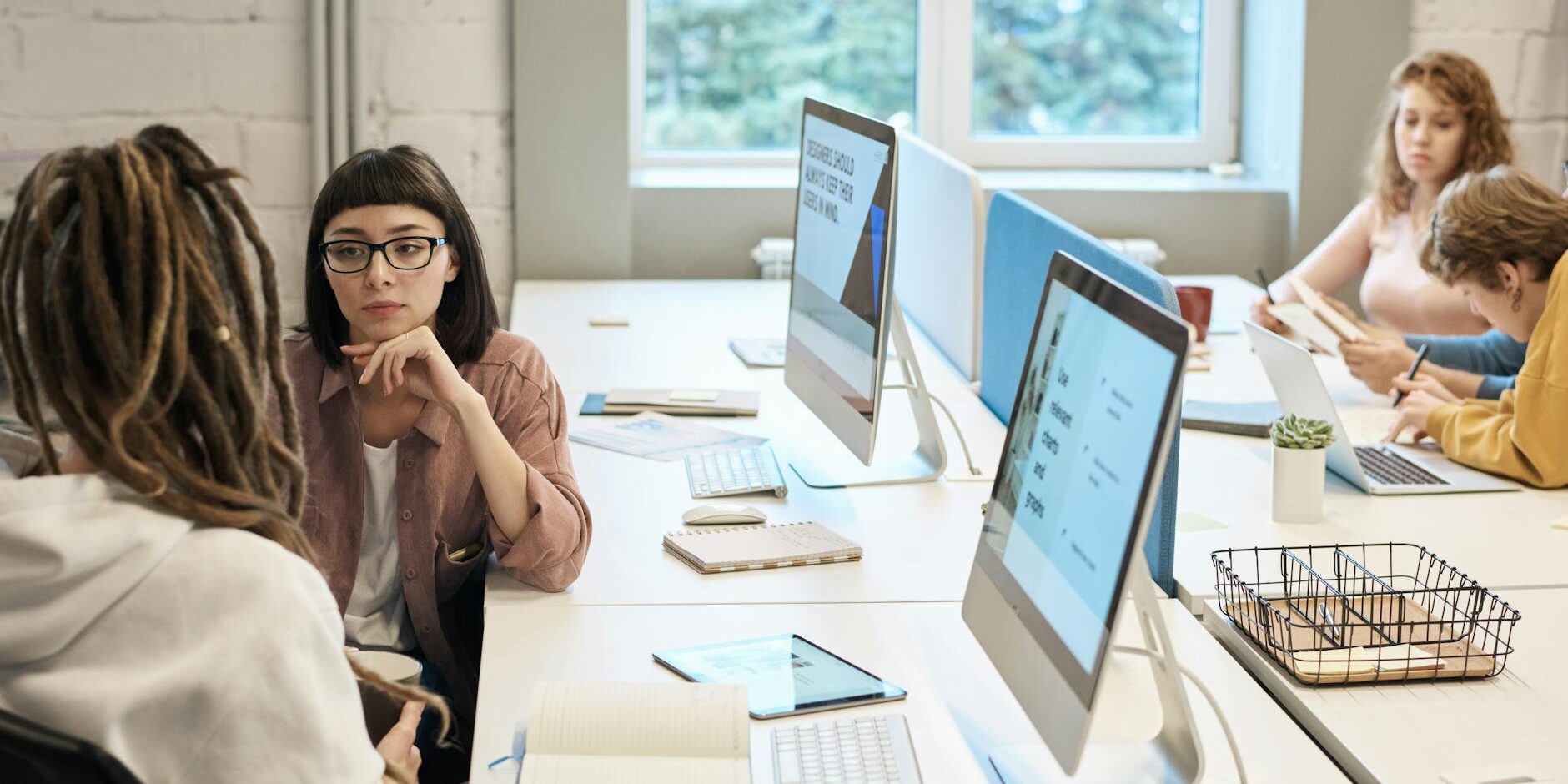 people in front of the computers