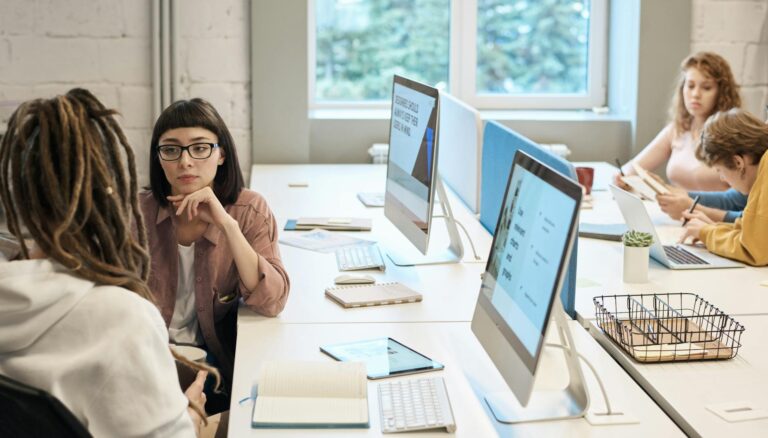 people in front of the computers