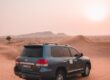 suv on brown sand