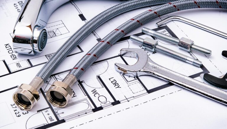 wrench and pipes on sketch