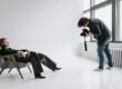 model reclining on a chair at a photo session