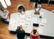 people in the office discussing a project