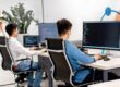 people using computers at work