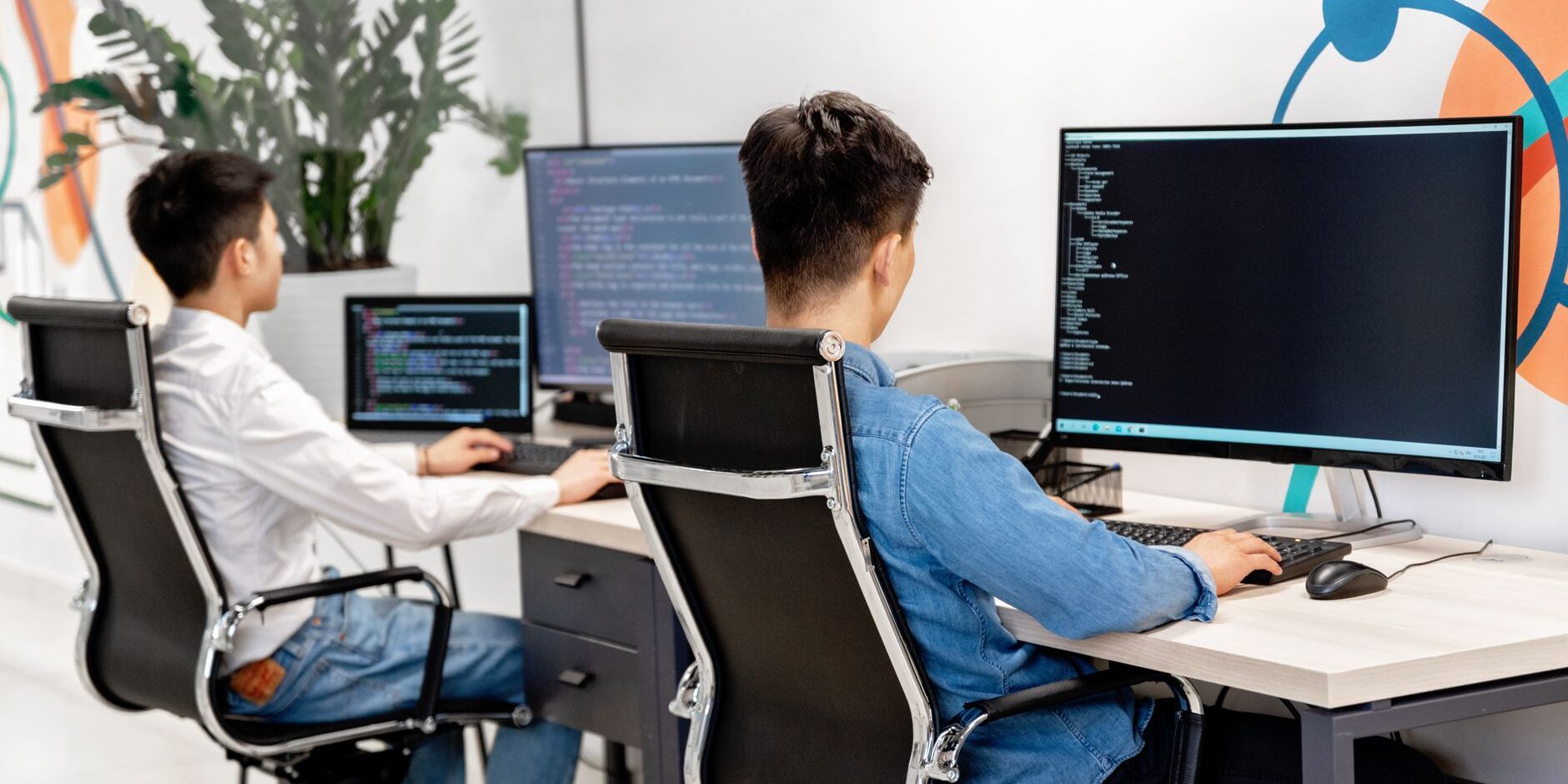 people using computers at work
